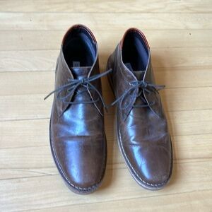 Men’s brown leather dress boots.